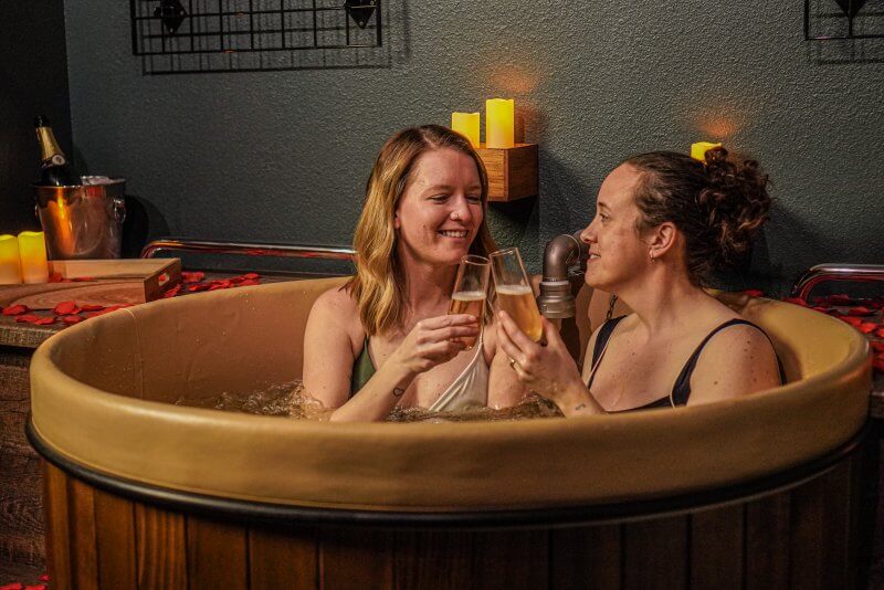 2 women at Oakwell Beer Spa in Denver for romantic getaways in Denver