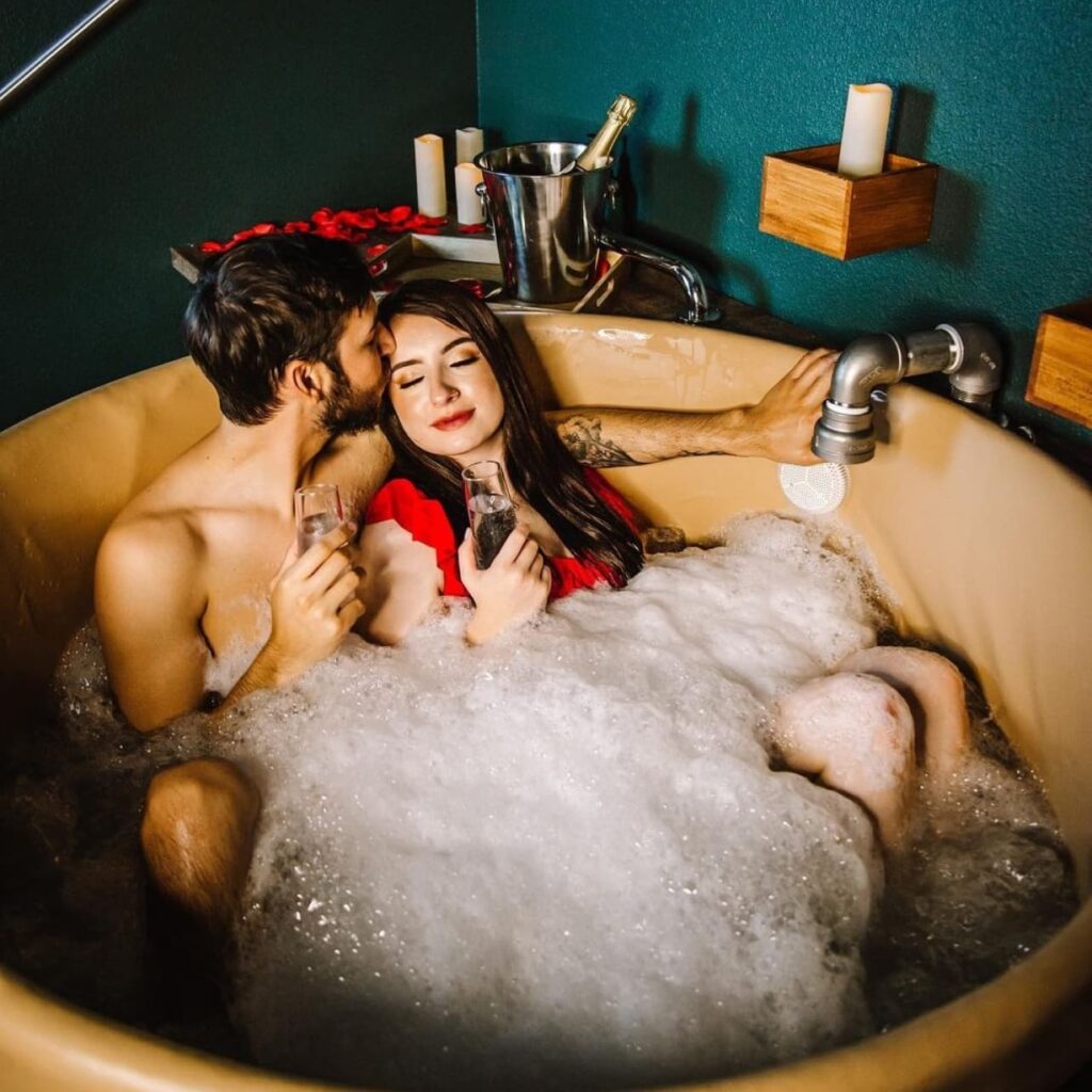 Couple enjoying beer bath