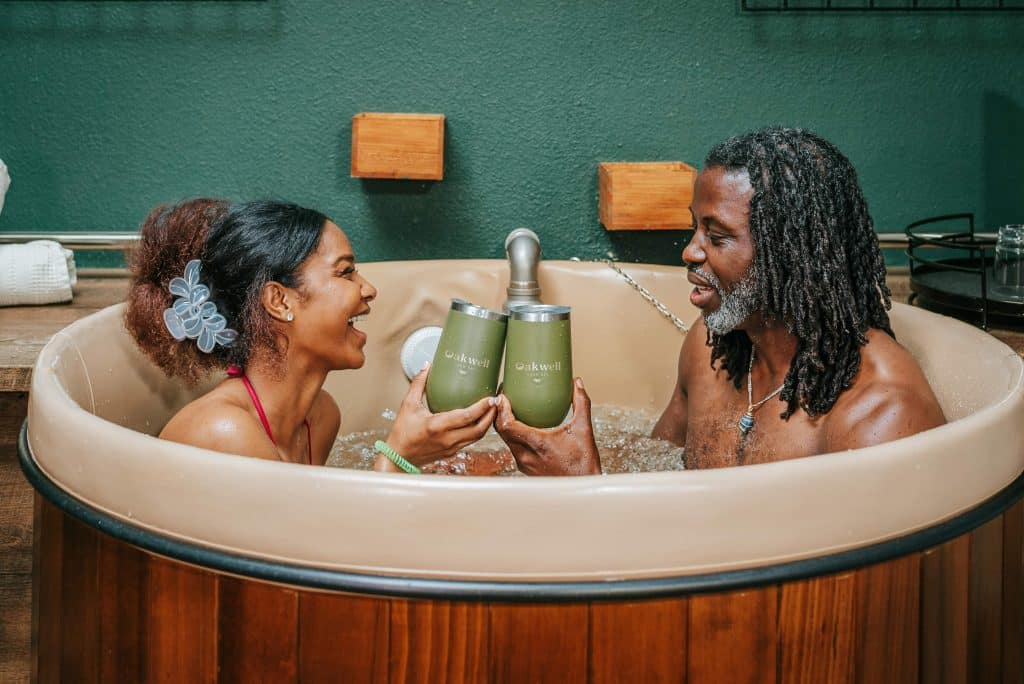 Couple drinking in beer bath