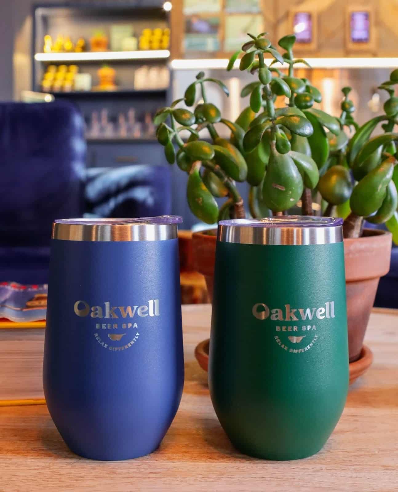 two Oakwell Beer Spa tumbler with beer
