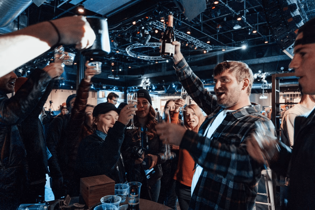 A bachelor party celebrates with champagne