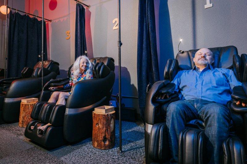 couple in Zero Gravity Massage chairs at Oakwell Beer Spa in Denver