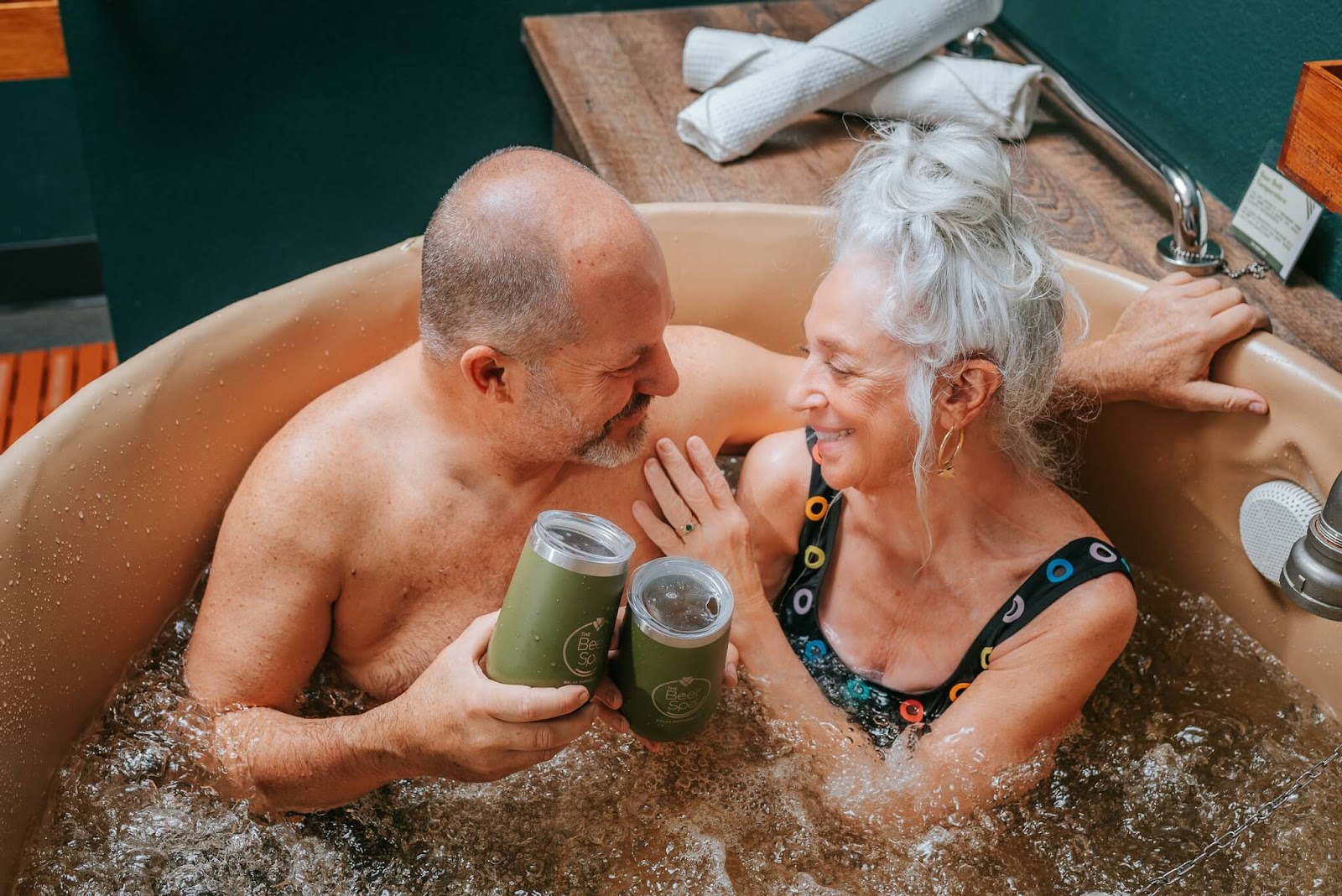 couple at Oakwell Beer Spa taking a beer bath