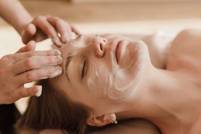 women getting a facial spa treatment