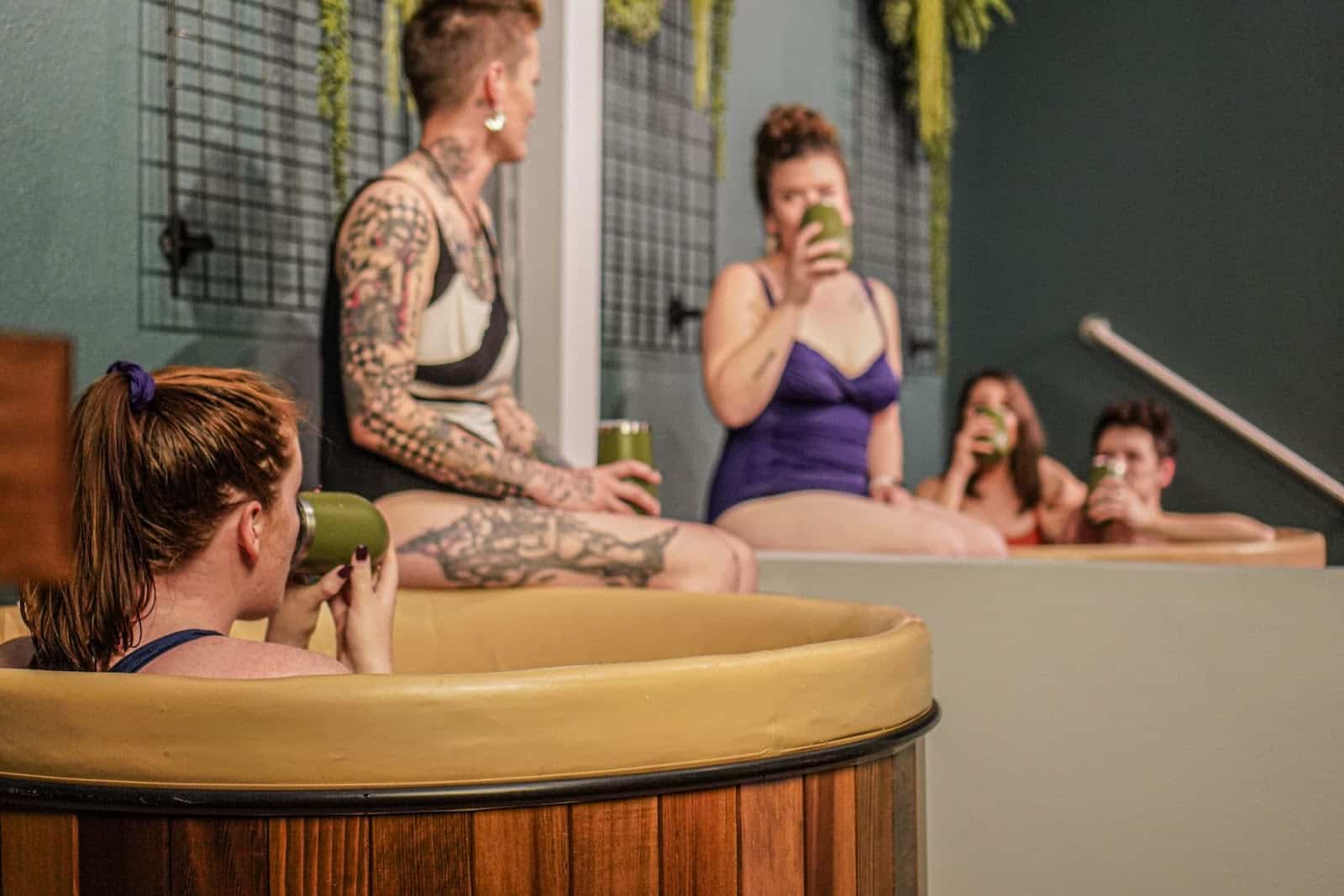 Five people in Private Beer Therapy Rooms at Oakwell Beer Spa in Denver for spa day