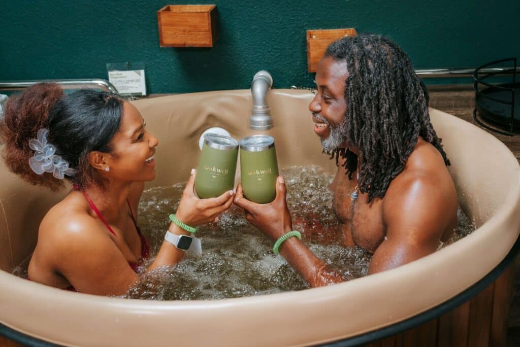 Couple enjoying beer bath at Oakwell Beer Spa