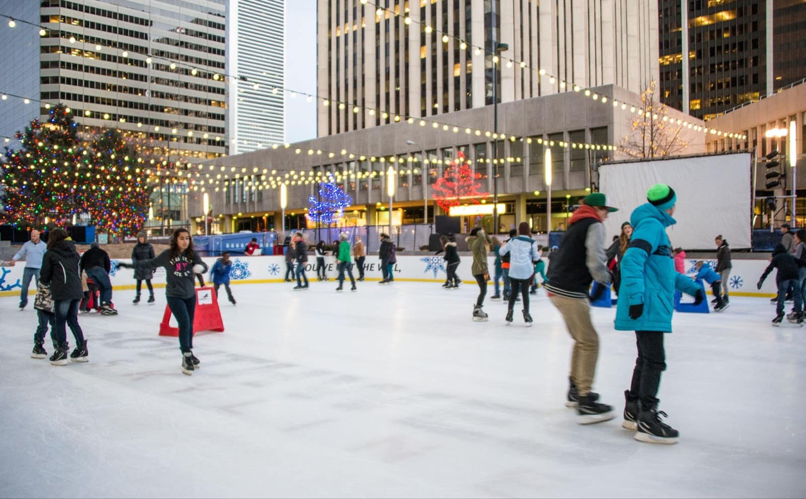 People iceskating at the Downtown Denver Rink