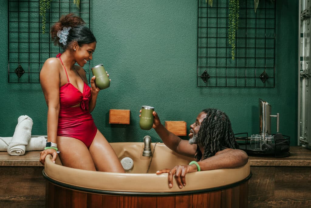 Couple enjoying beer bath at Oakwell Beer Spa