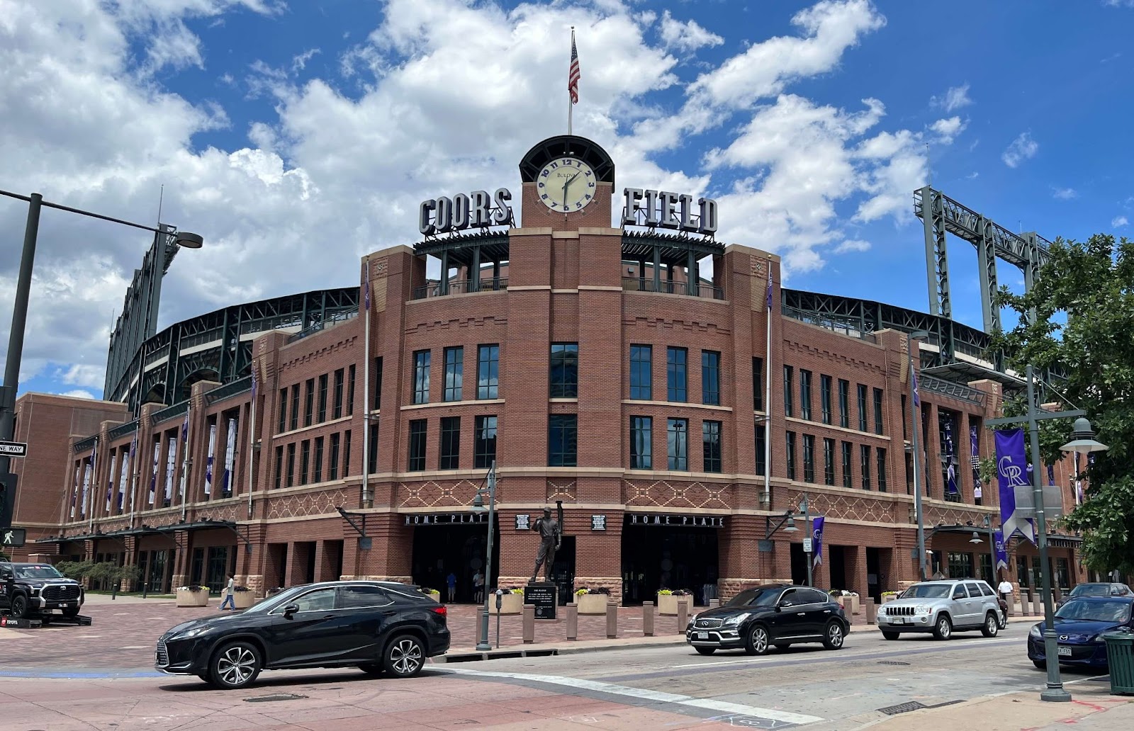 Cars and the front of Coors Field where the Colorado Rockies play 