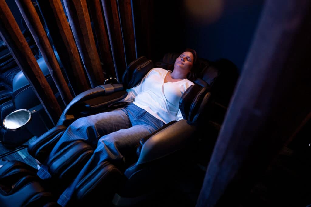 A woman enjoys a zero gravity massage at Oakwell Beer Spa