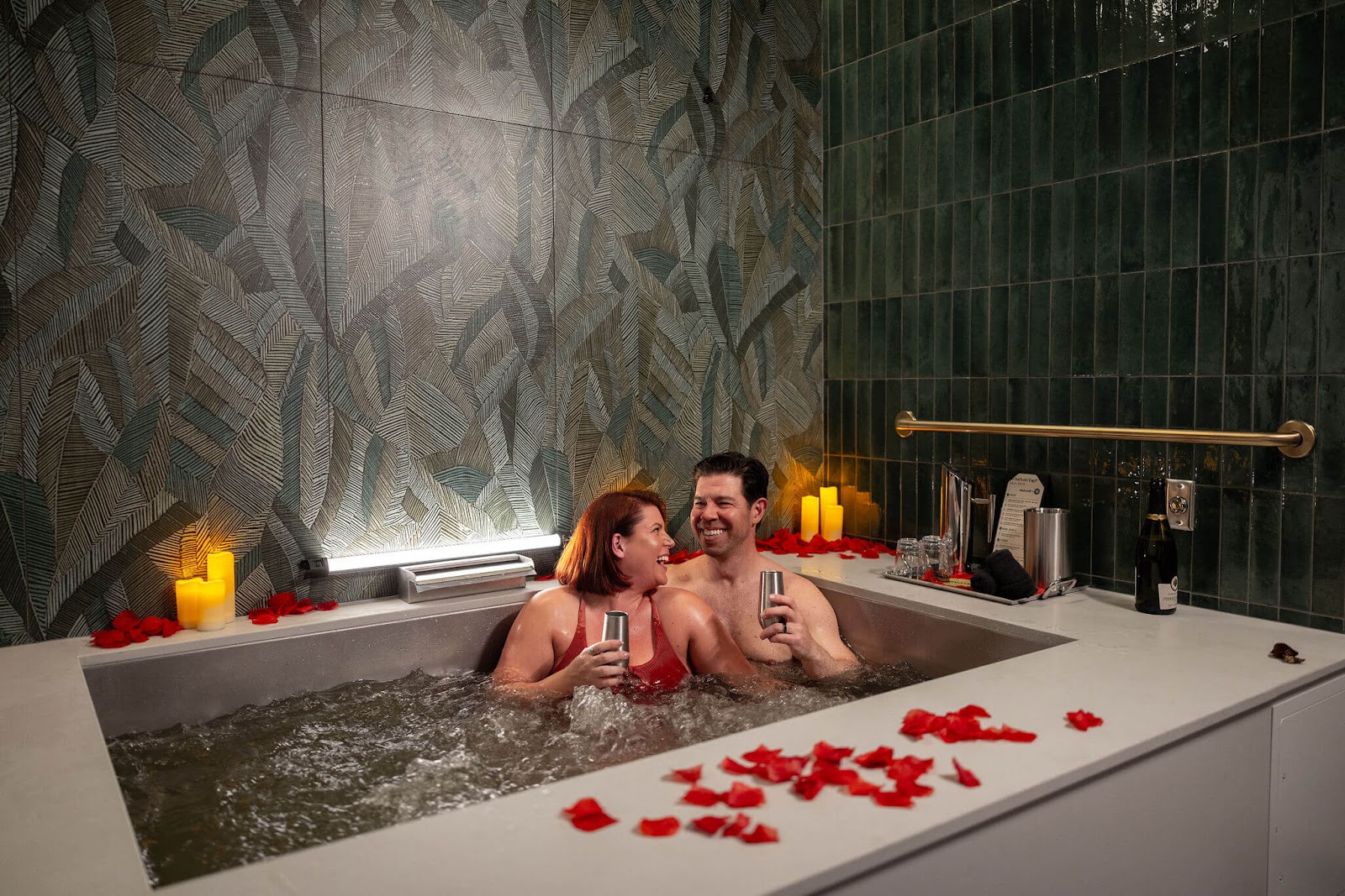 Couple taking a beer bath at Oakwell Beer Spa for honeymoon in Denver
