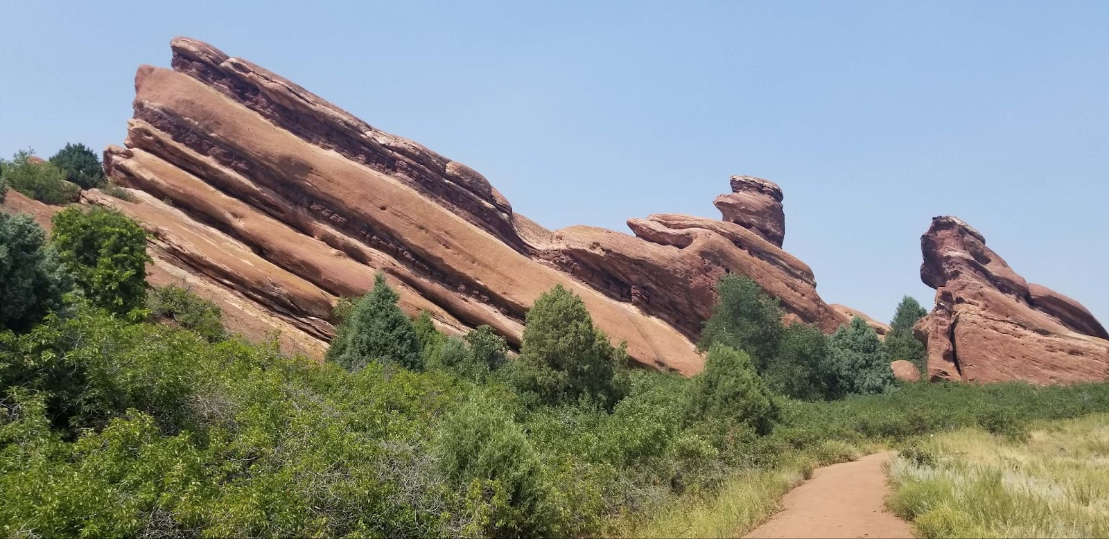 red rock formations and trail at Red Rocks Park