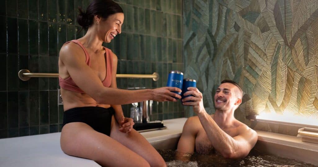 Couple taking a beer bath at Oakwell Beer Spa