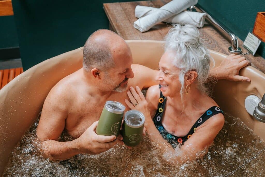 Couple in beer bath at Oakwell Beer Spa in Denver