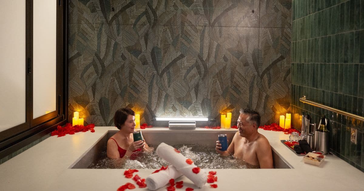 Couple enjoying beer bath spa treatment at Oakwell Beer Spa