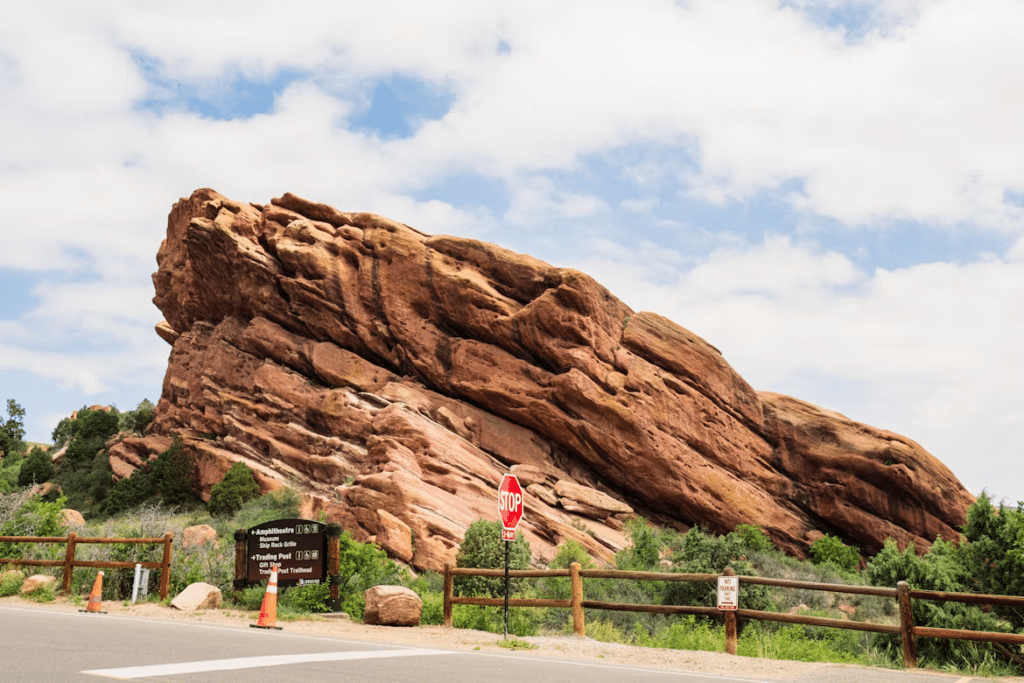 A shot of a Red Rocks Amphitheatre road with its iconic geologic formation